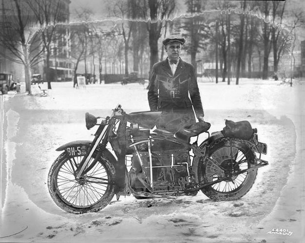 Man with Motorcycle in the Snow, Angelus Studio photographs, 1880s-1940s
