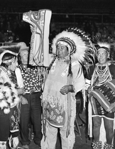 Chief Clarence Burke awarding dance prizes, Oregon Multicultural Archives