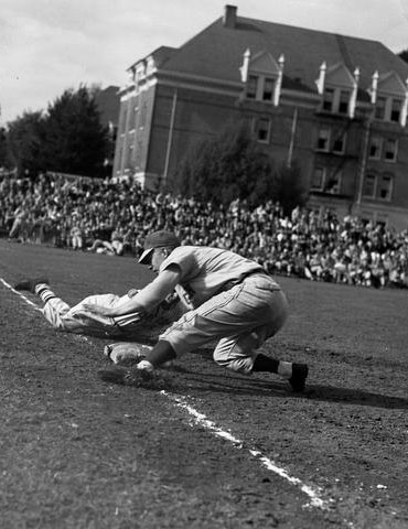 A close play at first base, 1948, Oregon State University Athletics
