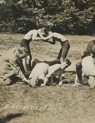 Wrestlers spell out 'OAC,' 1910, Oregon State University Athletics