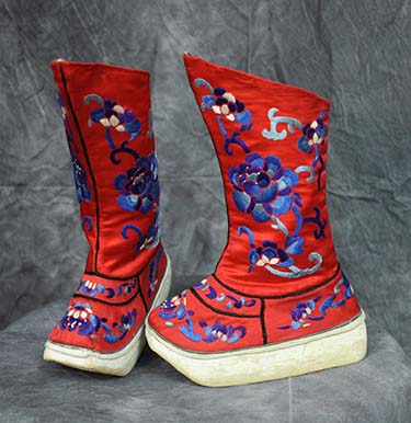 Children's boots of red satin embroidered with flowers in satin stitch in blues and white, Historic and Cultural Textile and Apparel Collection