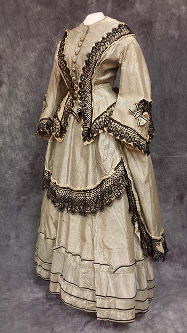 Dress ensemble of grey and white pinstripe silk taffeta trimmed in pleated ivory organdy with black crocheted lace overlay, Historic and Cultural Textile and Apparel Collection