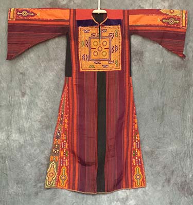 Thob Al Malak of red, saffron, and black vertical striped broadcloth with embroidery of silk couched with metallic threads, Historic and Cultural Textile and Apparel Collection
