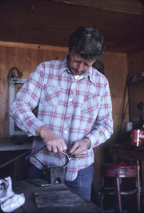 Mr. D sanding a spur to smooth for bluing, second view