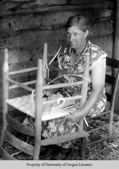 Mary Owenby, caning a chair