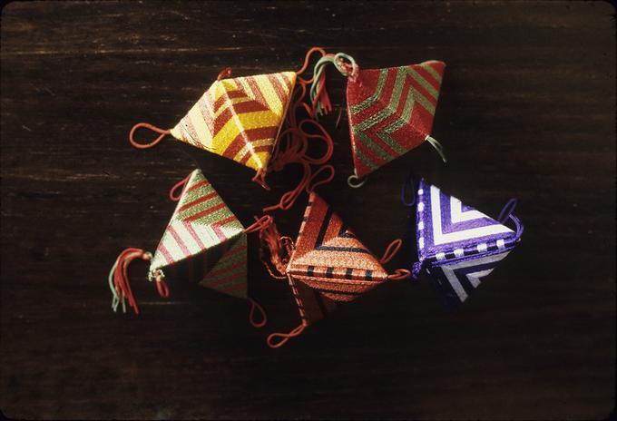 Five finished thread covered origami