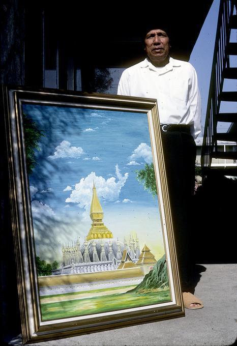 That Luang national monument / building in capitol Vientiane: two oil paintings done this year by Mr. Rangsith picturing two views of the same building