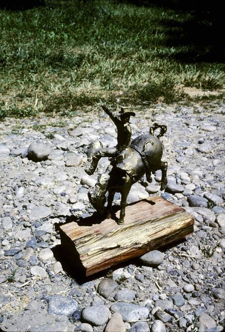 Figurine of Mr. H riding bronc