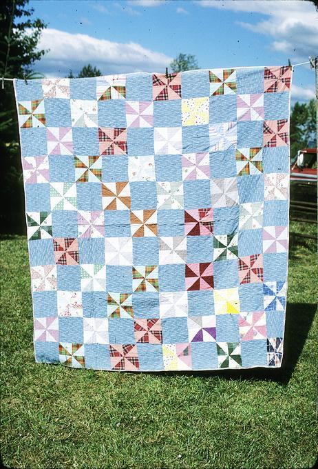 77 x 69 inch Hattie and Emma made blocks together and quilted it together, around 1939. Made it because didn't have much quilts and needed some. Made here in Junction City.