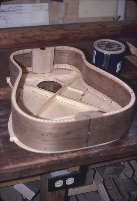 Guitar body before gluing showing cross braces