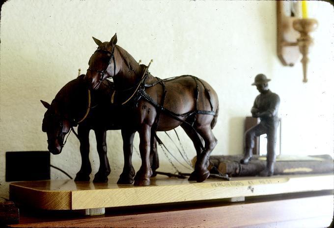 'Percherons at Rest', completed in about 1976, black walnut, 58 x 13 inches