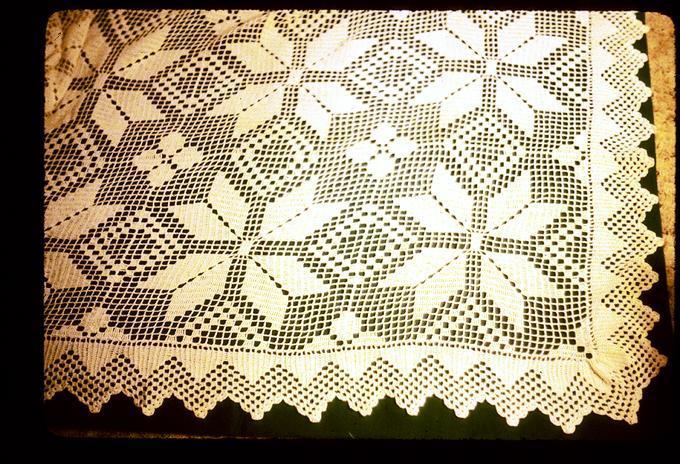 Bedspread, 7 foot 9 inch x 6 foot 4 inch, crocheted in #50 cotton by LBP, 1954, after she saw Joe Koehler's christening robe and liked the pattern