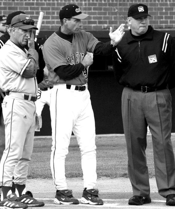 Coach Pat Casey and umpire