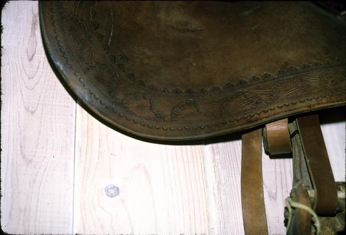 Side Saddle made in John Day, detail of tooling on skirts