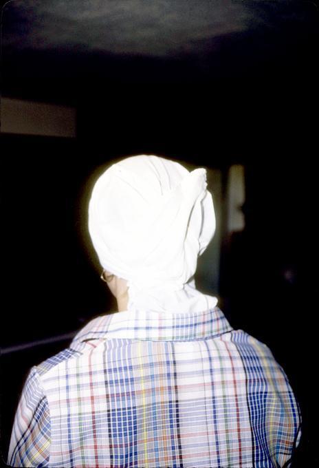 Mrs. Anne Urquiaga models traditional scarf, back