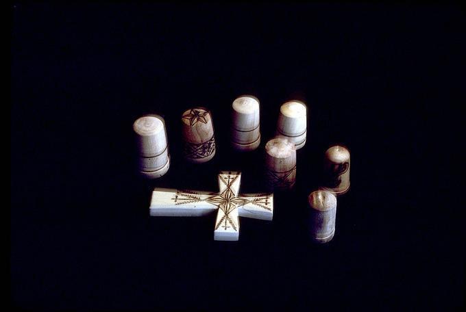 7 thimbles from 1.75 in to 1.25 in, 13 in cross all made about March 1979