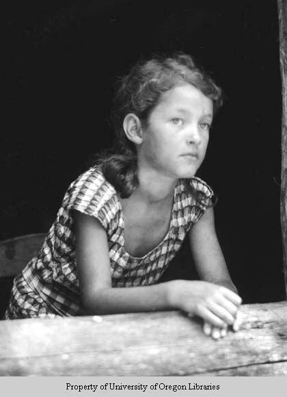 Nancy Sue Waldroup, girl leaning on log windowsill