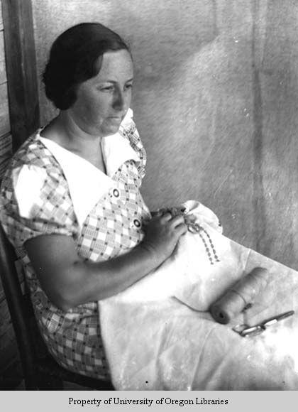 Ethel May Stiles, doing needlework