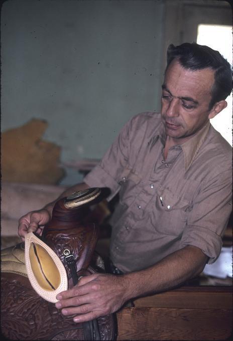 Mr. Charles Baker demonstrates placement of bucking rolls