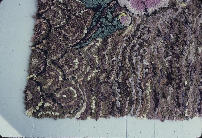 Hooked rug 46 x 36 inch (made by Ellen O'Connor in the 1940s from old material and wool mixed)