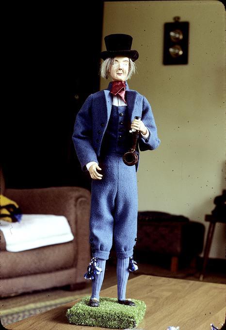 Handmade doll, 22 in tall made by Mrs. Villo from Portland, given to Mrs. Konks. Tartumaa costume, 1972.