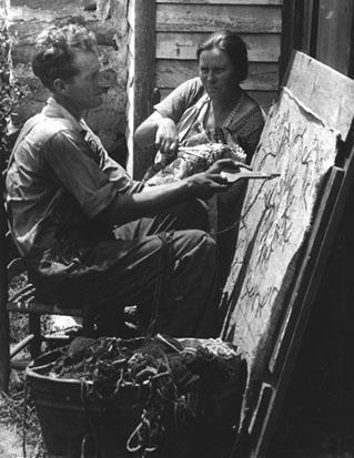 Sarah Owen Anderson and Ned Anderson, making hooked rug