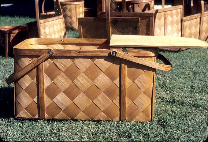 Two picnic baskets, one shellacked, one unshellacked. Both made 1973. 20.5 x 12.5 x 9.75 inch.