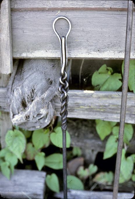 Tools with somewhat decorative handles that he made many years ago to use on his forge: hook and shovel (hook = 30 in long