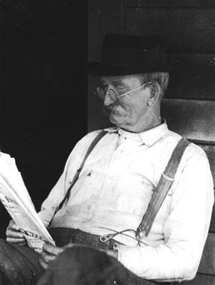 Man reading newspaper