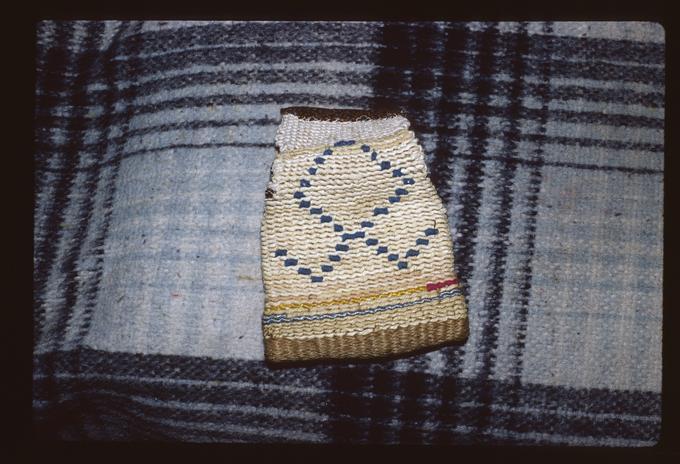 Baskets by Master Artist Francis Brunoe displayed on couch