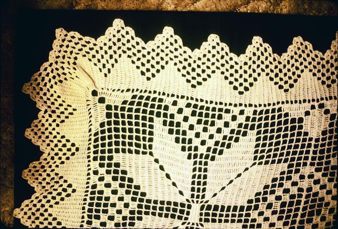 Bedspread, 7 foot 9 inch x 6 foot 4 inch, crocheted in #50 cotton by LBP, 1954, after she saw Joe Koehler's christening robe and liked the pattern