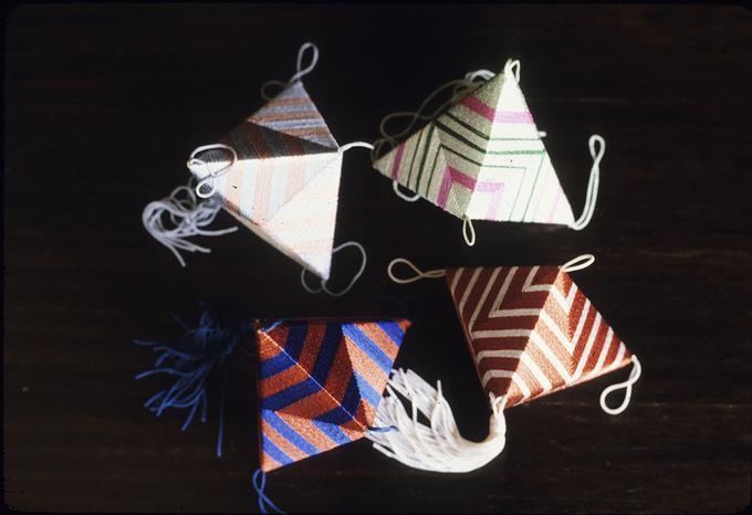 Four finished thread covered origami