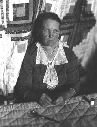 Mother of Mrs. Burnett, quilting