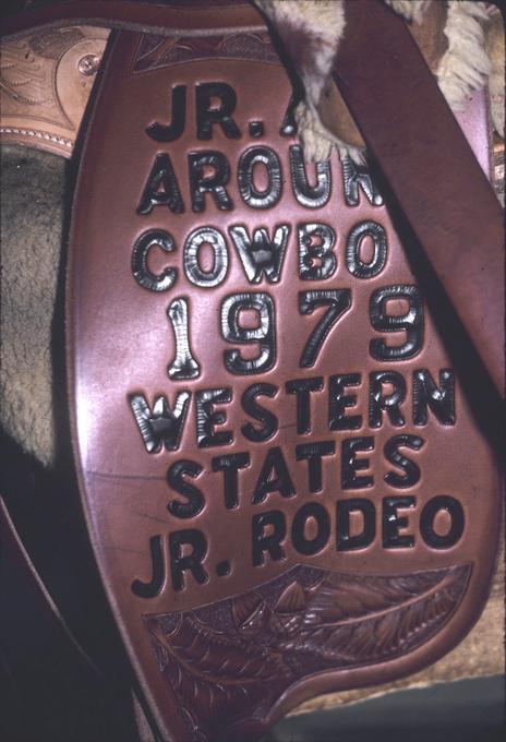 Baker trophy saddle, close up of wording on fender