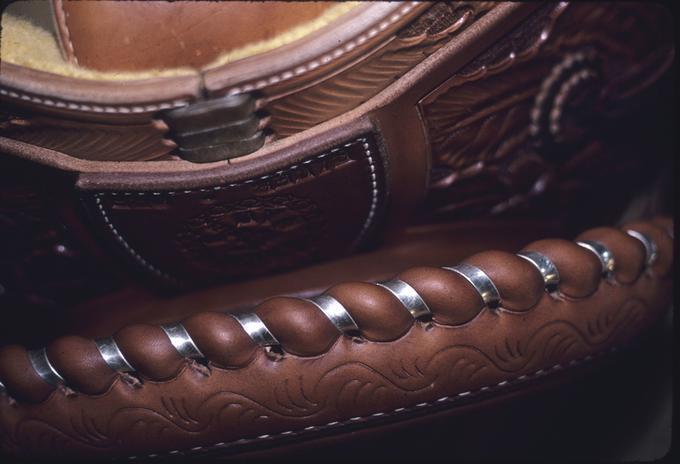 Baker trophy saddle, from rear, showing silver coil on cantle