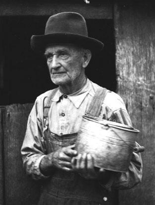 Man, holding bucket