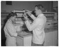 Pharmacy lab, Dr. Ben Cooper and student, October 1959