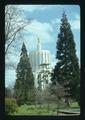 West end of Oregon State Capitol with trees, Salem, Oregon, 1975