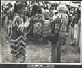 Lady and Jingle Dress Dancer, from Indian Photographing Tourist Photographing Indian series, Taos, New Mexico (recto)