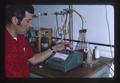 Technician working in a laboratory, Oregon State University, Corvallis, Oregon, 1975