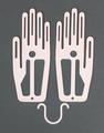 Hand Forms of pink plastic for drying washed gloves, and hook for hanging