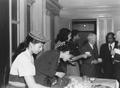 Urban League office staff Delores Casanasas, Bobbie Nunn, Gertrude Rae, and Myrtle Carr with Paul Williams in the background