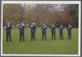 Naval ROTC students performing a gun salute