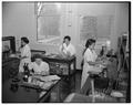 Students working in a Home Economics research lab, 1957