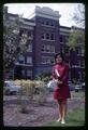 Thai international student in Agricultural Economics Department in front of Agriculture building, Oregon State University, Corvallis, Oregon, circa 1965