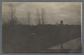 Man (presumably Arbuthnot) shooting into a river, accompanied by Arbuthnot's dog, circa 1910
