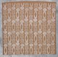 Textile Panel of brown cotton with white block print of Tiki God figures