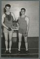 Two athletes with trophy, circa 1930
