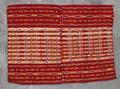 Apron of two textile panels sewn together at center of striped woven wool in deep red and natural white