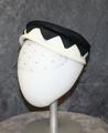Modified Pillbox of black and white straw with fabric triangle pattern encircling hat